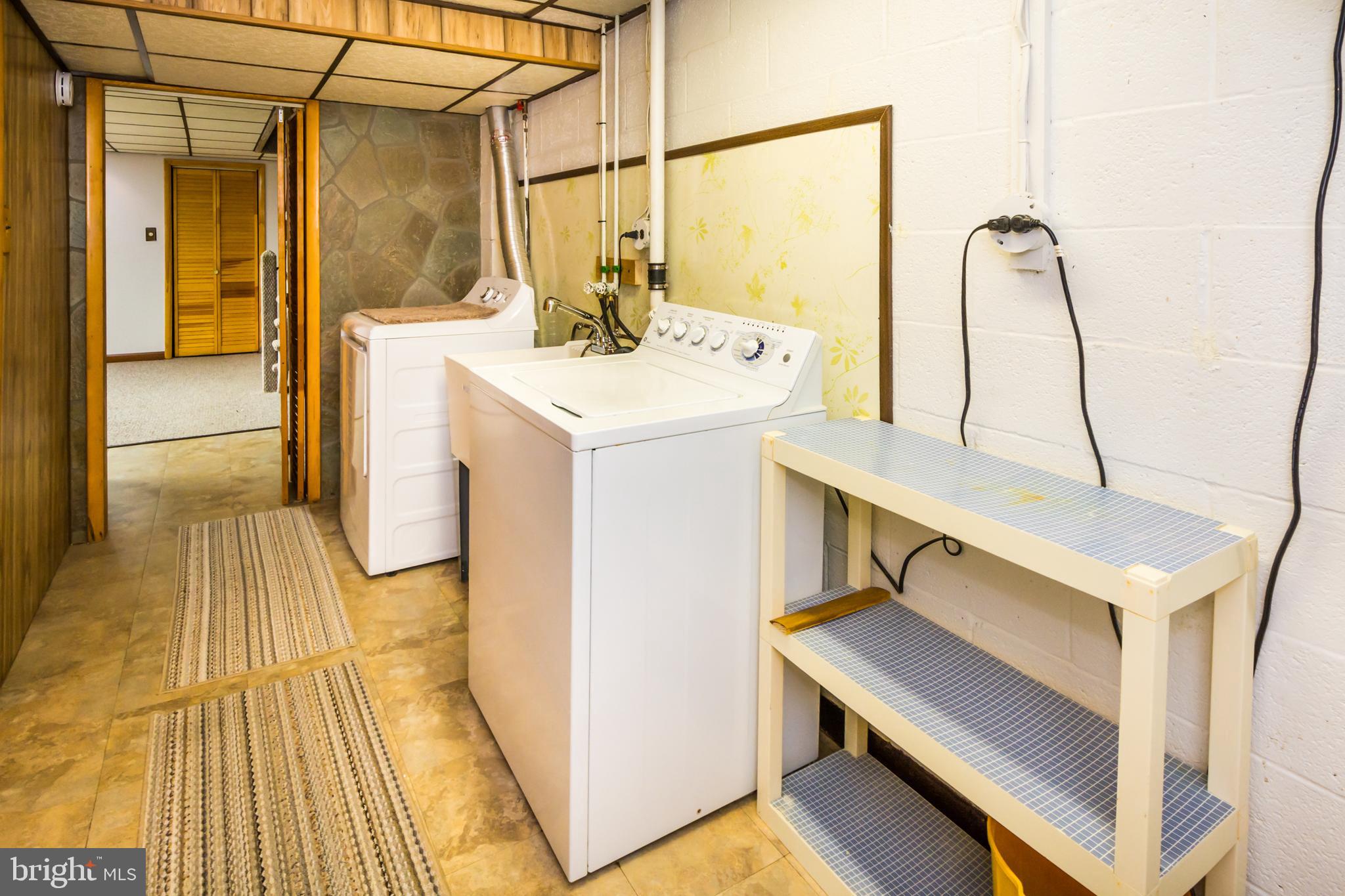 2137 Sunnythorn Road Baltimore, MD 21220 - Photo 28 of 34 a bathroom with a sink a toilet and mirror