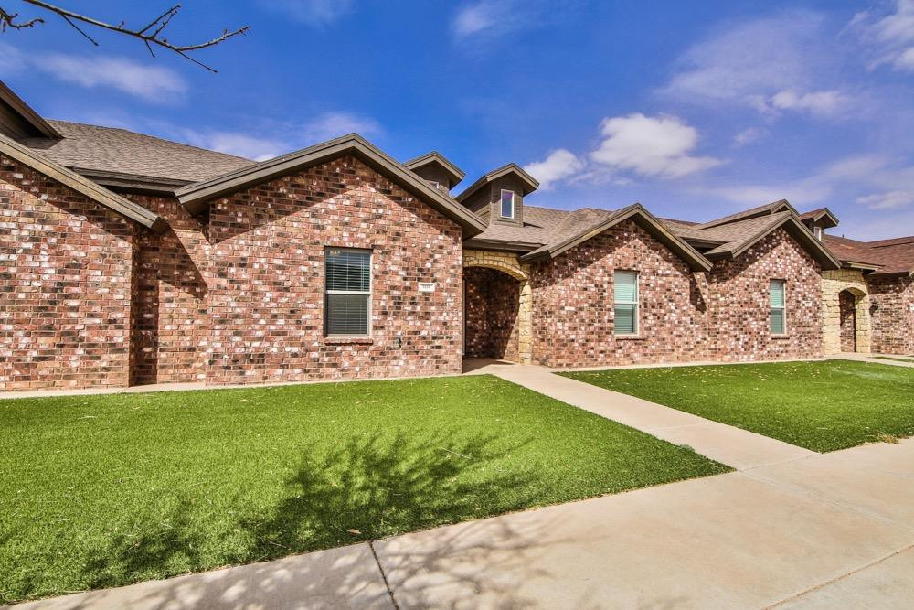3118 113th Street Lubbock, TX 79423 - Photo 24 of 24 a view of a house with a yard