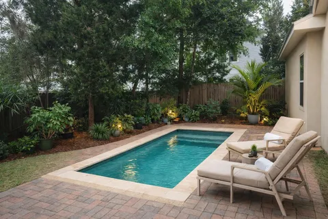 a view of backyard with seating space