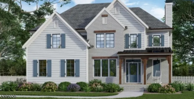 front view of brick house with a yard