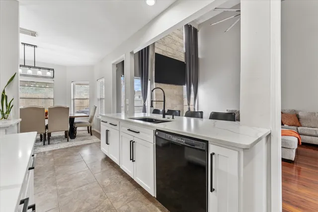 a spacious bathroom with a sink double vanity and a mirror