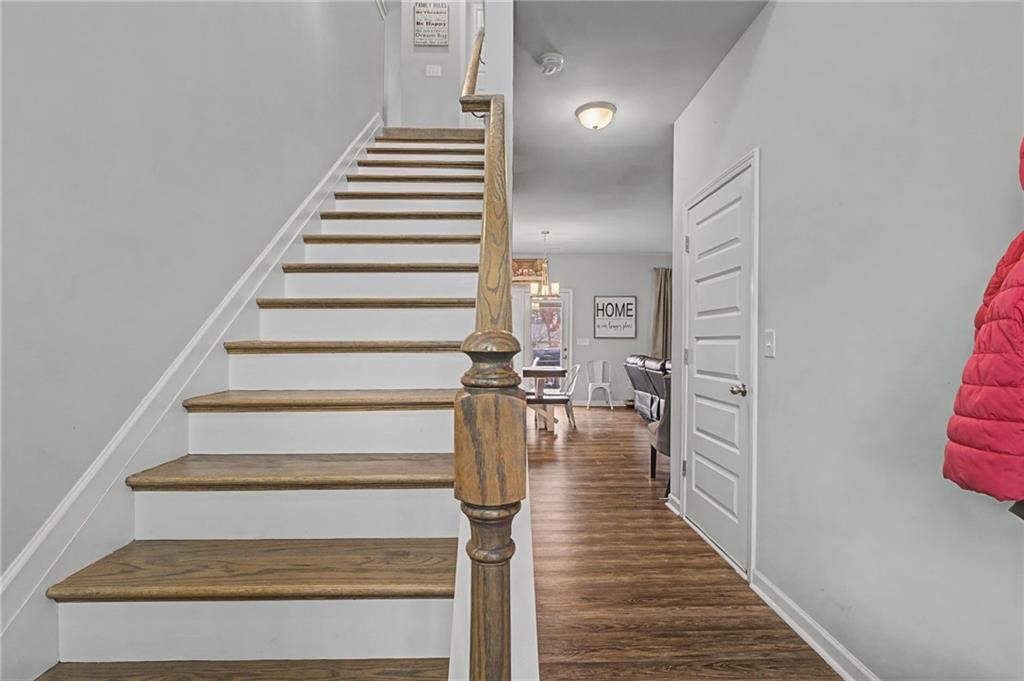 108 Mcginnis Circle Calhoun, GA 30701 - Photo 5 of 56 a view of entryway and hall with wooden floor