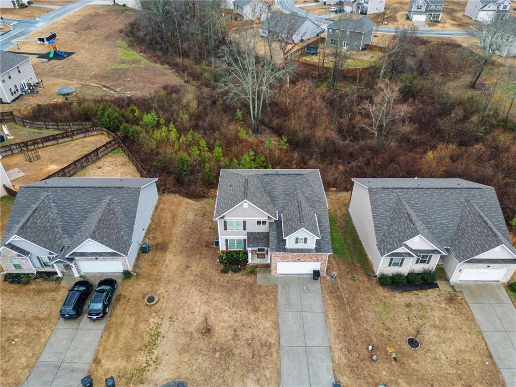 108 Mcginnis Circle Calhoun, GA 30701 - Photo 51 of 56 an aerial view of a house with swimming pool and sitting space