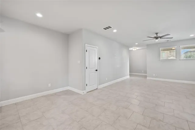 a view of a room with white walls