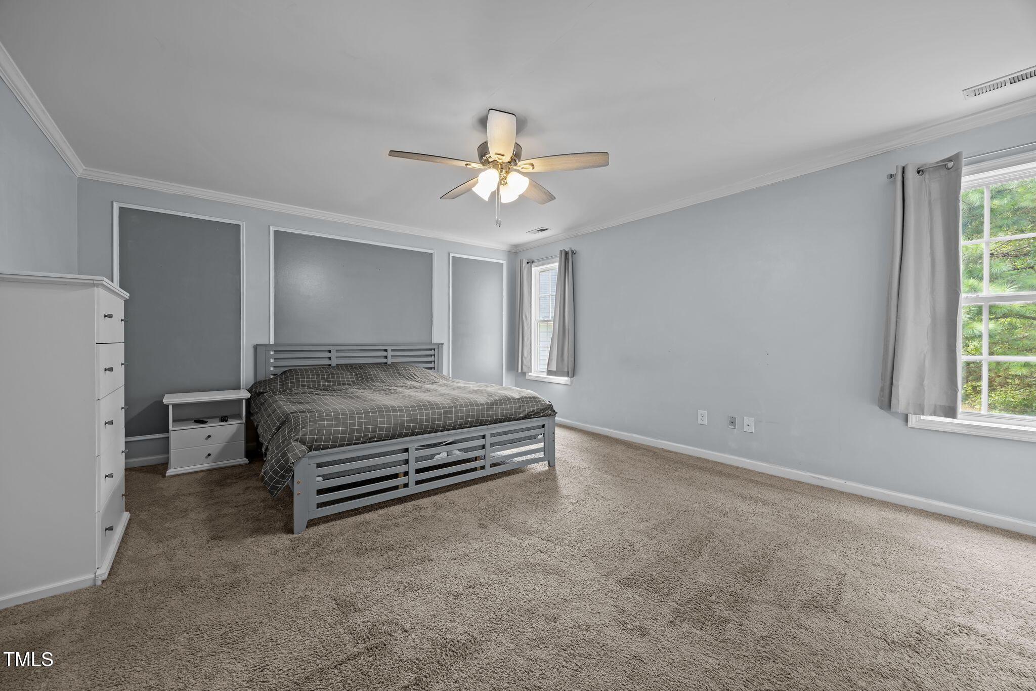 2310 Shepherd Valley Street Raleigh, NC 27610 - Photo 9 of 27 a living room with furniture and a ceiling fan