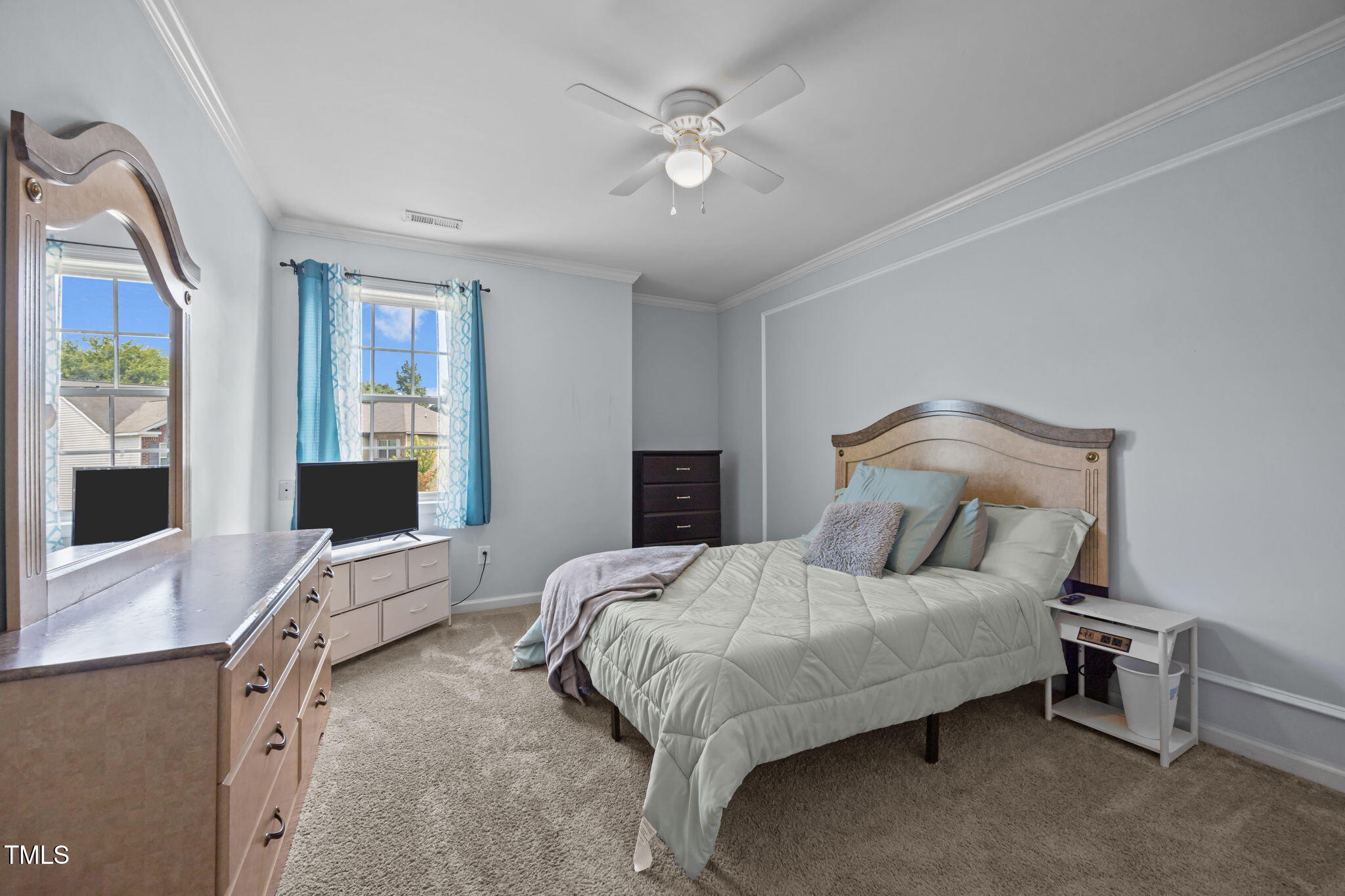 2310 Shepherd Valley Street Raleigh, NC 27610 - Photo 16 of 27 a bedroom with a bed and a desk