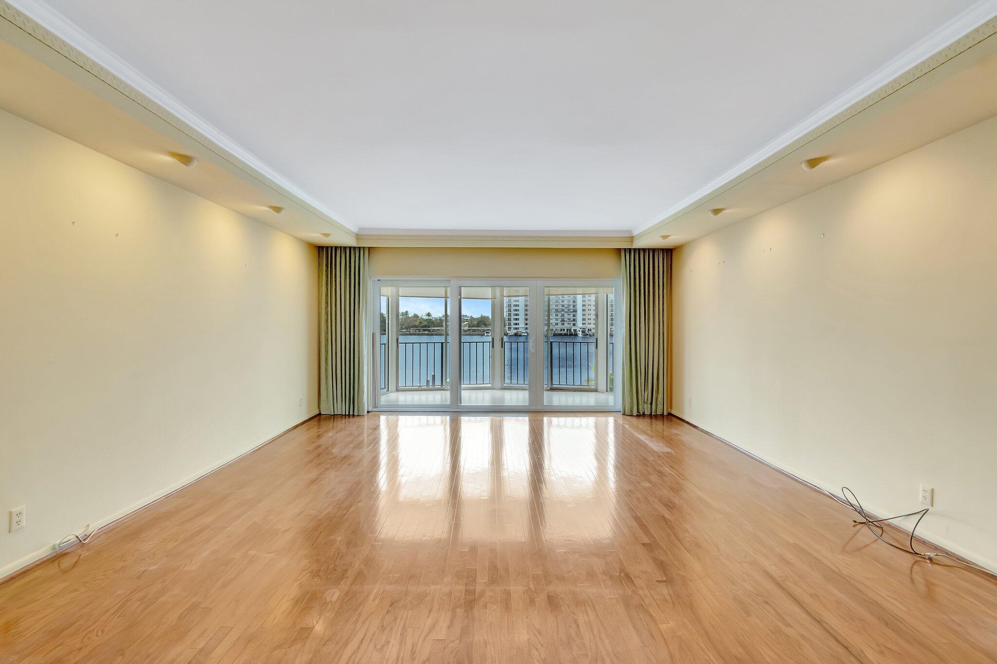 220 Mac Farlane Drive, Unit S203 Delray Beach, FL 33483 - Photo 11 of 56 Living Room onto Patio