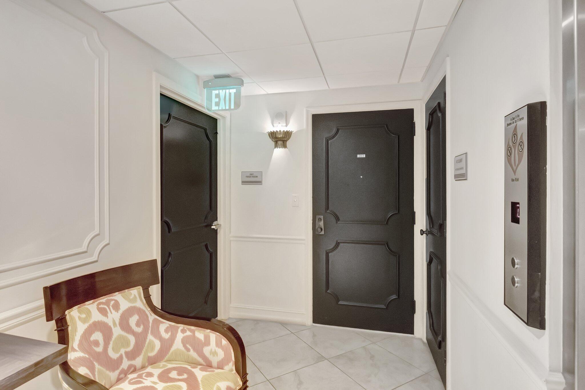 220 Mac Farlane Drive, Unit S203 Delray Beach, FL 33483 - Photo 26 of 56 Hallway Front Door