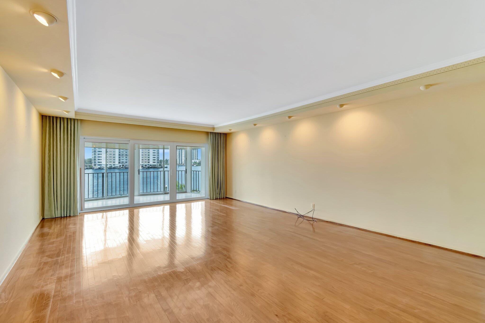 220 Mac Farlane Drive, Unit S203 Delray Beach, FL 33483 - Photo 10 of 56 Living Room Area onto Patio