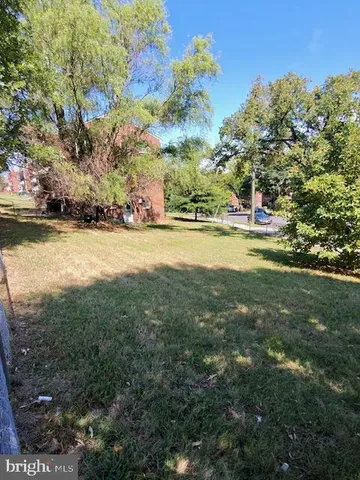a view of an ocean and a yard