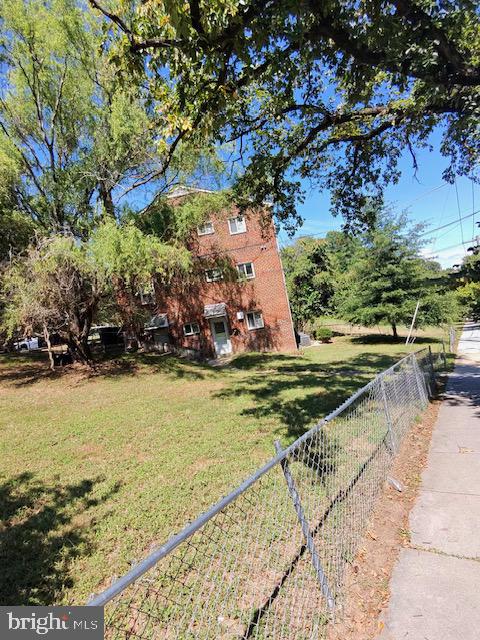 4778 South Capitol Terrace Southwest, Unit C Washington, DC 20032 - Photo 3 of 12 a view of swimming pool with a yard