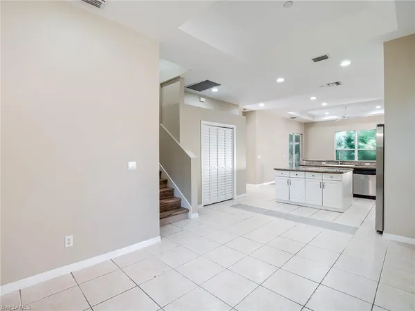 a kitchen with granite countertop white cabinets and a granite counter tops