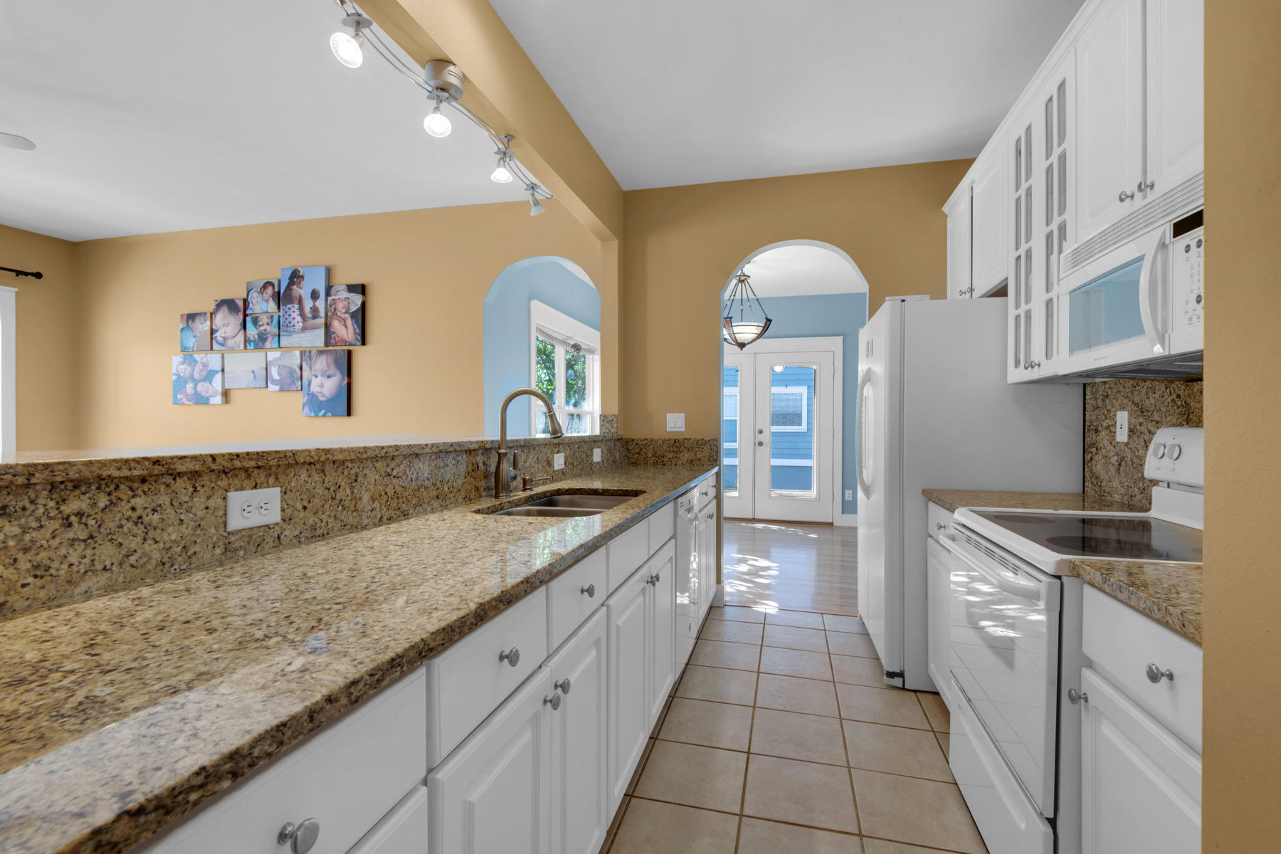 74 Garden Street Santa Rosa Beach, FL 32459 - Photo 15 of 43 a kitchen with a sink and cabinets