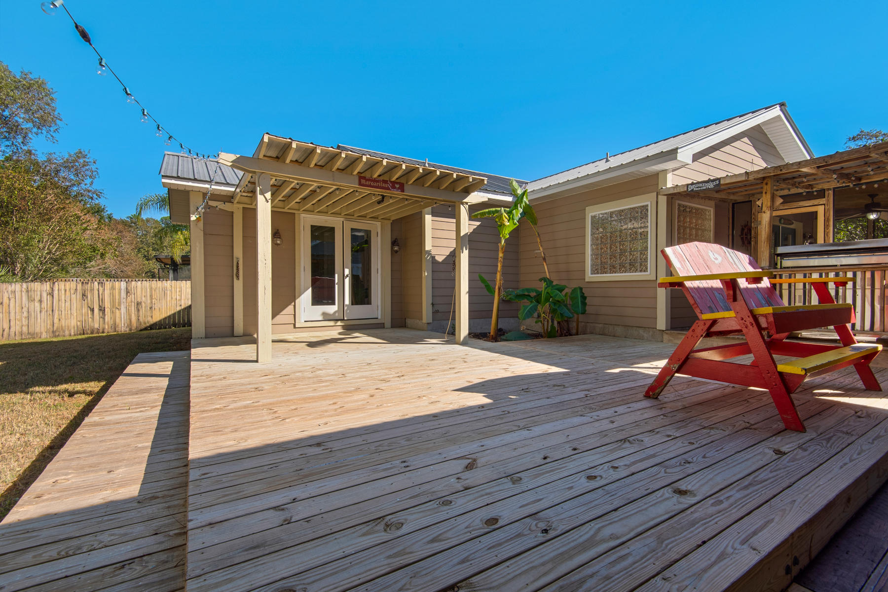 74 Garden Street Santa Rosa Beach, FL 32459 - Photo 31 of 43 a patio with table and chairs