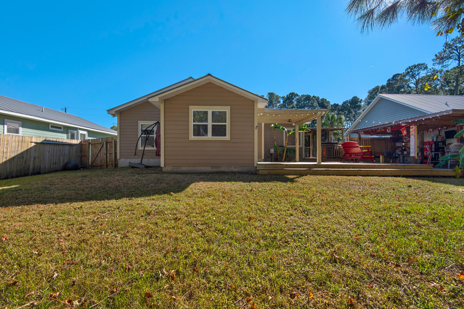 74 Garden Street Santa Rosa Beach, FL 32459 - Photo 35 of 43 a front view of a house with a yard