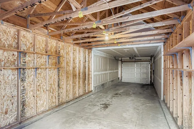 a view of a room with wooden walls