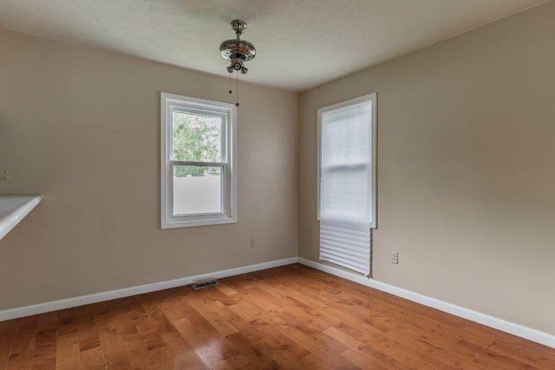 405 Meridian Drive Springfield, IL 62702 - Photo 9 of 26 a view of an empty room with a window