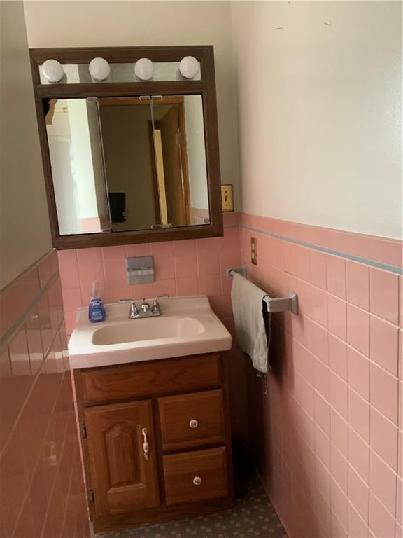 1178 Amity Ridge Road Amity, PA 15311 - Photo 11 of 15 a bathroom with a sink and a mirror