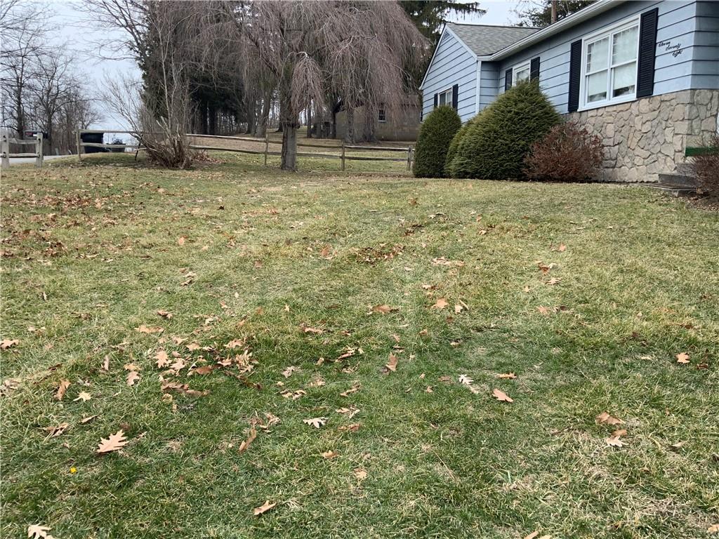 1178 Amity Ridge Road Amity, PA 15311 - Photo 12 of 15 a front view of a house with a yard
