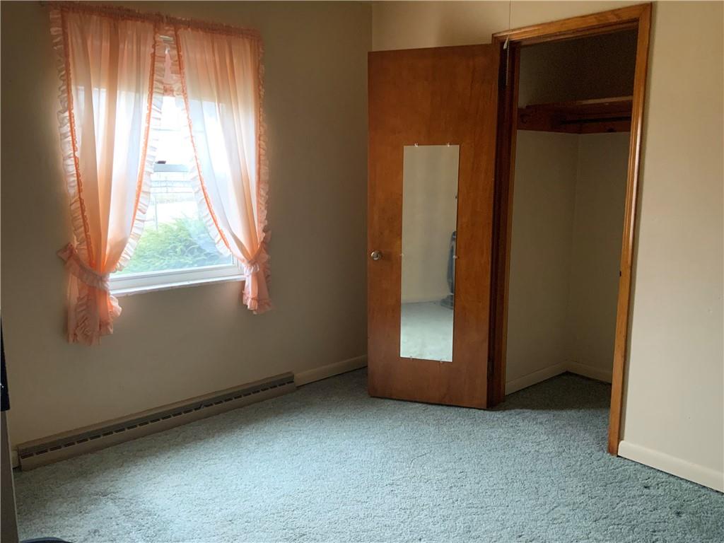 1178 Amity Ridge Road Amity, PA 15311 - Photo 8 of 15 an empty room with windows and closet