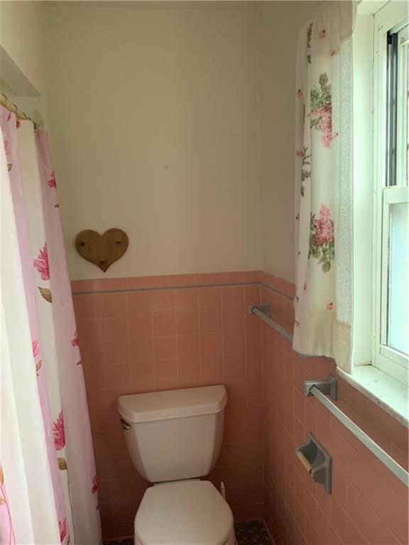 1178 Amity Ridge Road Amity, PA 15311 - Photo 10 of 15 a bathroom with a toilet and a shower curtain