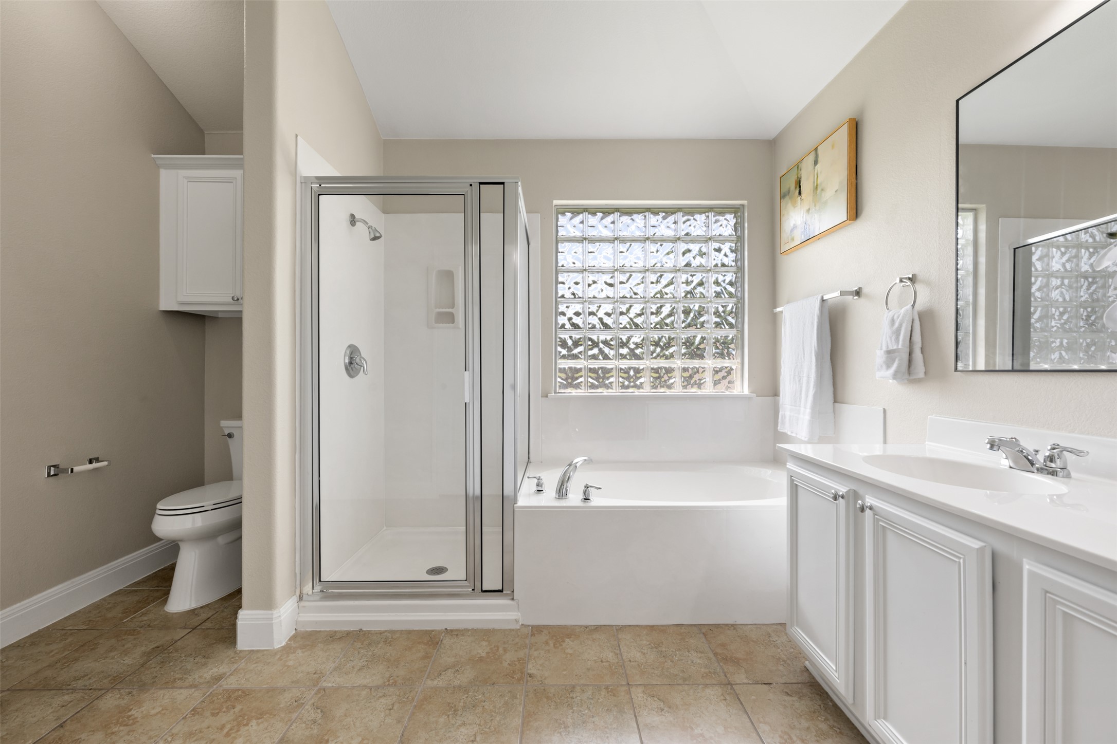 18820 Edinburgh Castle Road Pflugerville, TX 78660 - Photo 27 of 37 a bathroom with a sink a toilet and shower