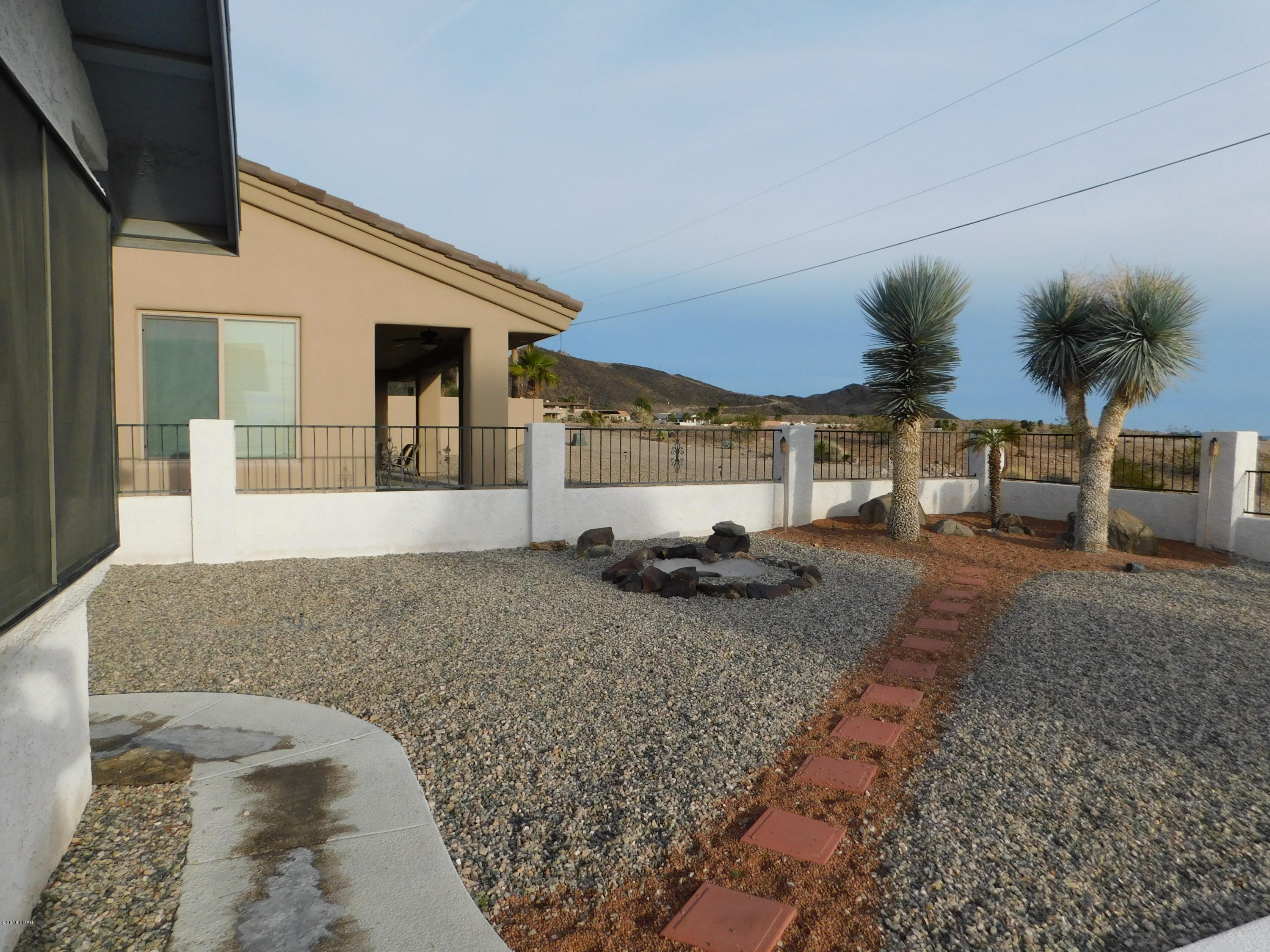 4010 Bluegrass Drive, Unit R Lake Havasu City, AZ 86406 - Photo 32 of 47 a view of a house with backyard and sitting area