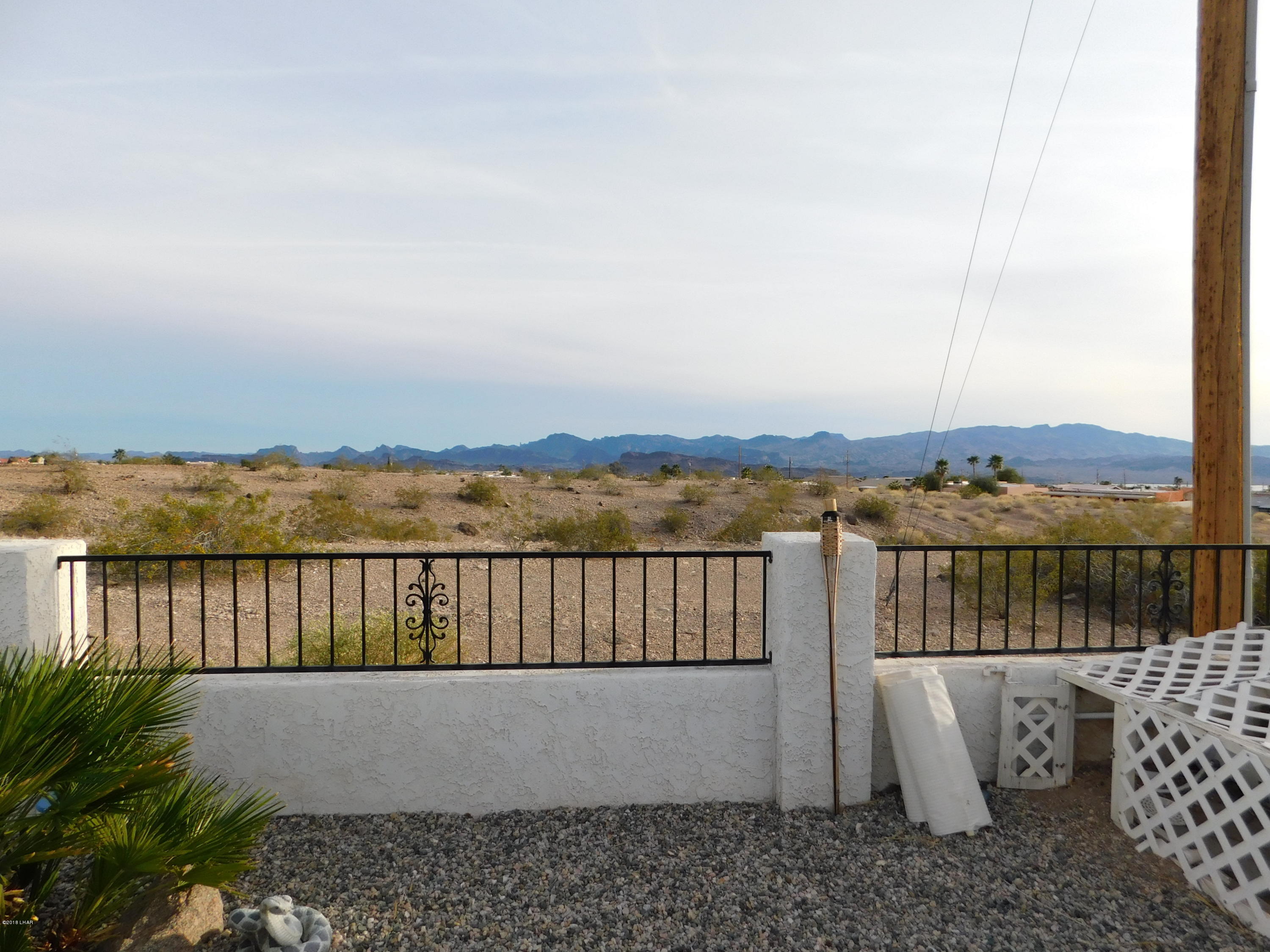 4010 Bluegrass Drive, Unit R Lake Havasu City, AZ 86406 - Photo 39 of 47 a view of a terrace with a lake view