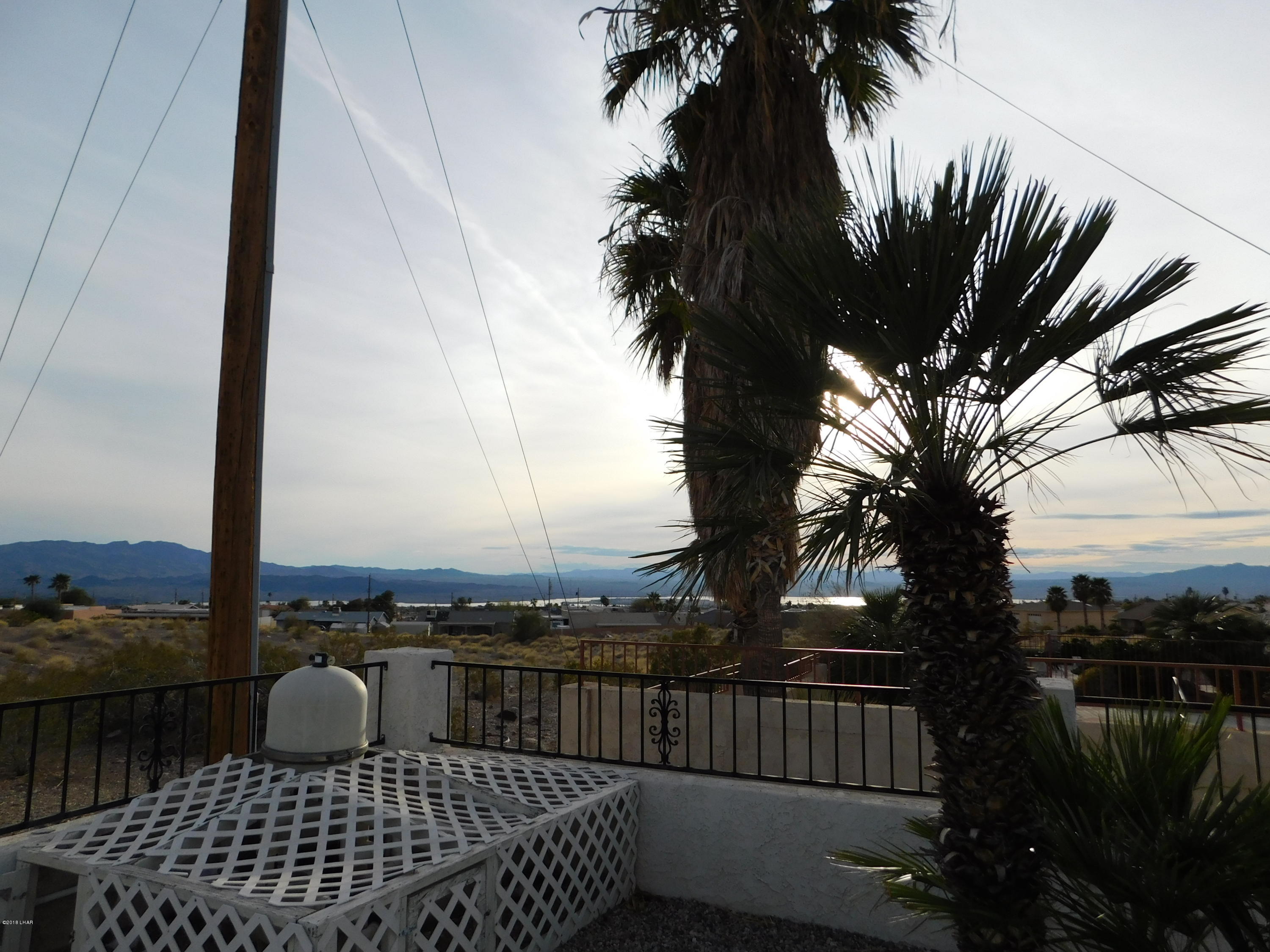 4010 Bluegrass Drive, Unit R Lake Havasu City, AZ 86406 - Photo 42 of 47 a view of balcony with wooden floor and outdoor space