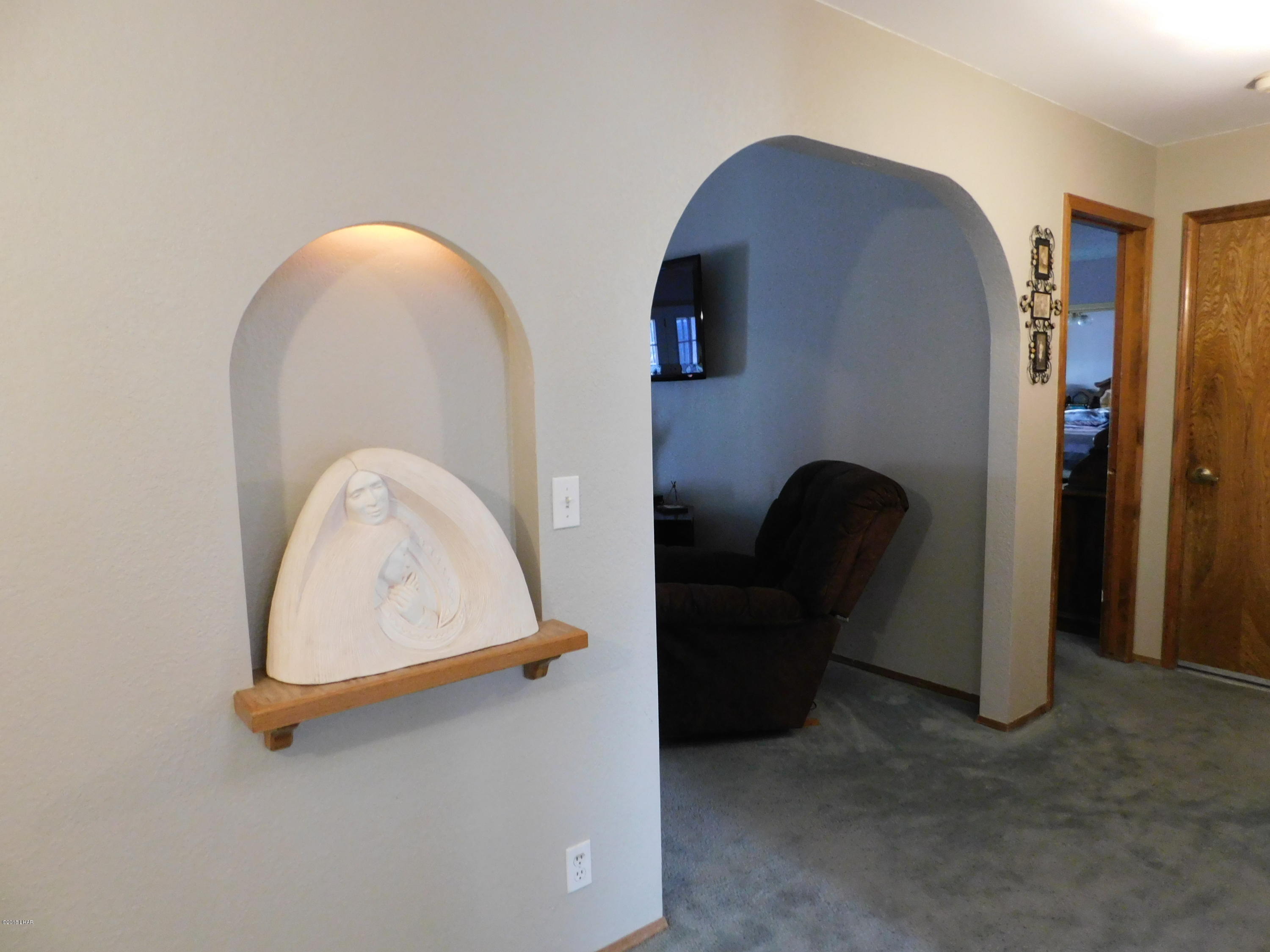 4010 Bluegrass Drive, Unit R Lake Havasu City, AZ 86406 - Photo 6 of 47 a view of a bench in a room