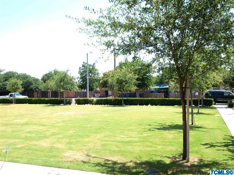 166 South Filbert Road Exeter, CA 93221 - Photo 14 of 15 a view of a swimming pool with an outdoor space and seating area