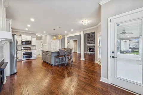 a bathroom with double sink and a mirror