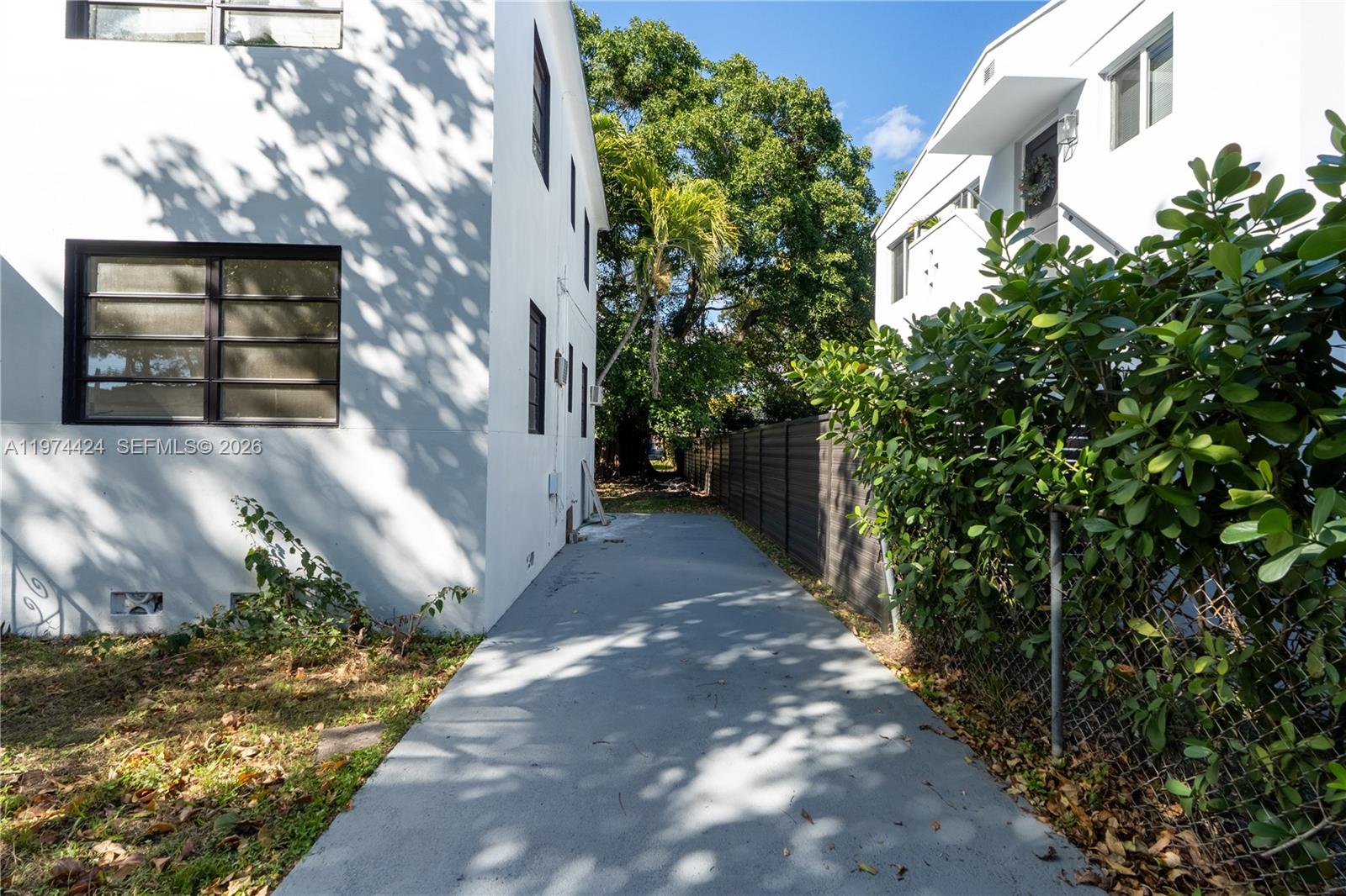 3665 Southwest 16th Street, Unit 3665 Miami, FL 33145 - Photo 3 of 25 a view of a house with a yard