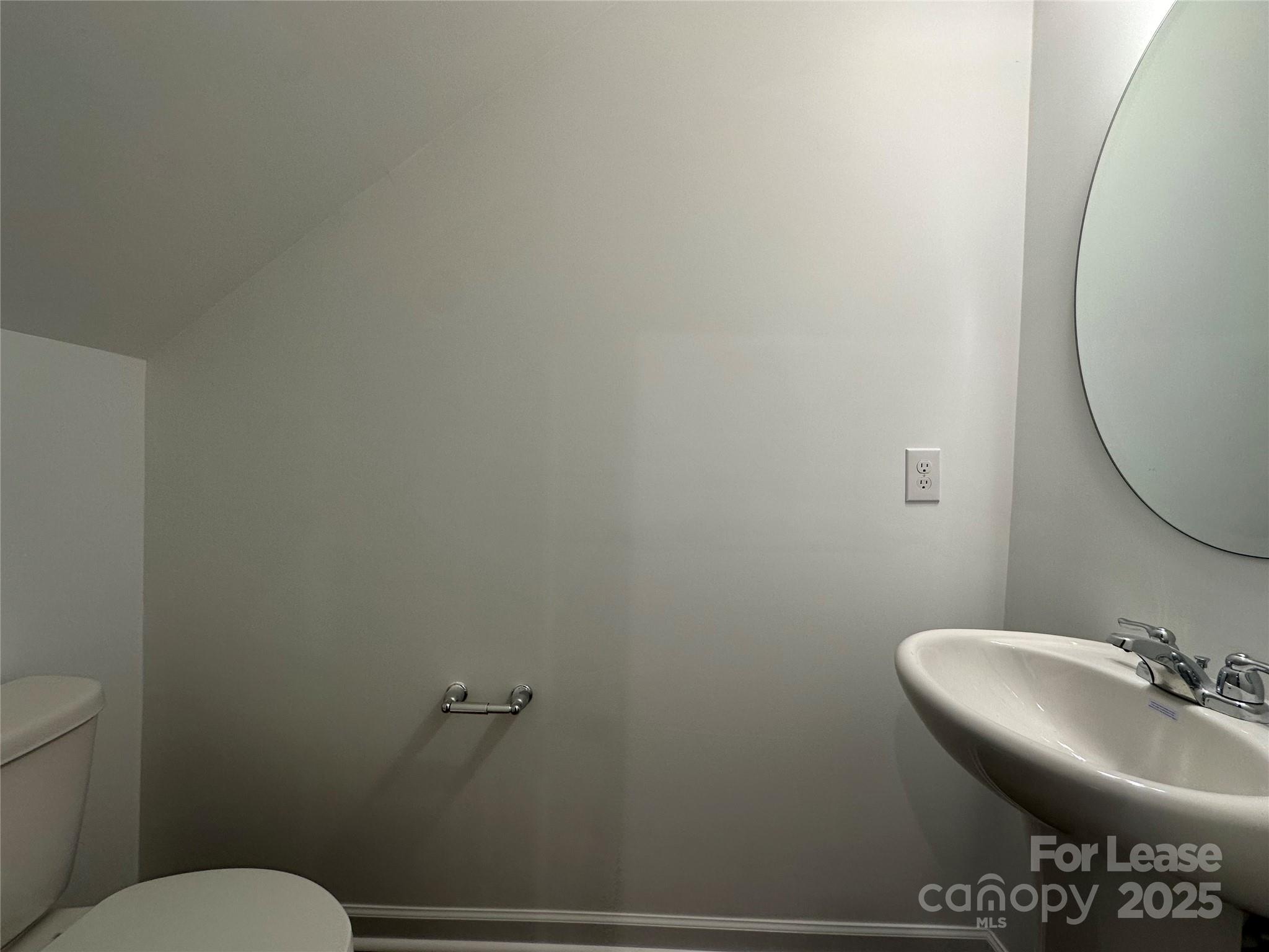 1872 Teachers House Road Concord, NC 28027 - Photo 8 of 14 a bathroom with a toilet and a sink