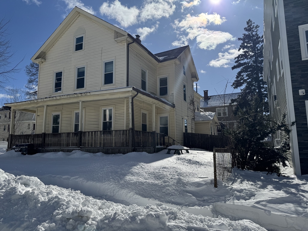 93 Fairfax Road Worcester, MA 01610 - Photo 1 of 35 a front view of a house with a yard