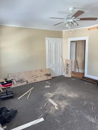 a view of a room with rack and toys