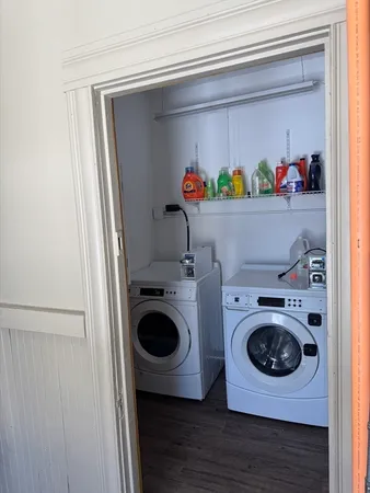 a utility room with dryer and washer