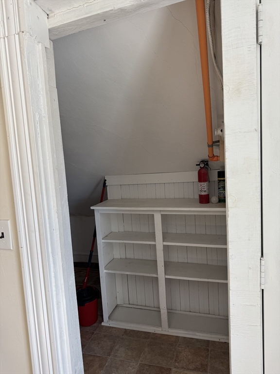 93 Fairfax Road Worcester, MA 01610 - Photo 25 of 35 a view of walk in closet with empty racks