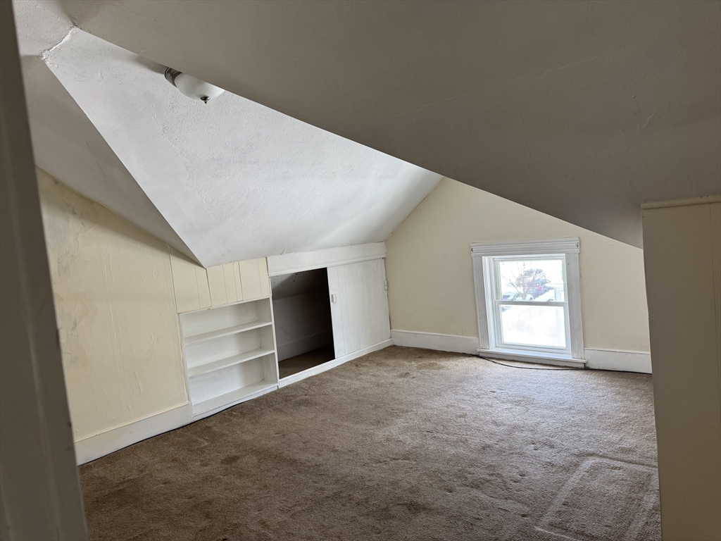 93 Fairfax Road Worcester, MA 01610 - Photo 28 of 35 a view of an empty room with a window