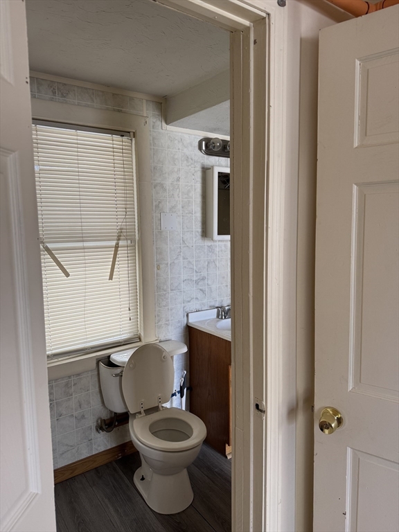 93 Fairfax Road Worcester, MA 01610 - Photo 5 of 35 a bathroom with a toilet and a sink