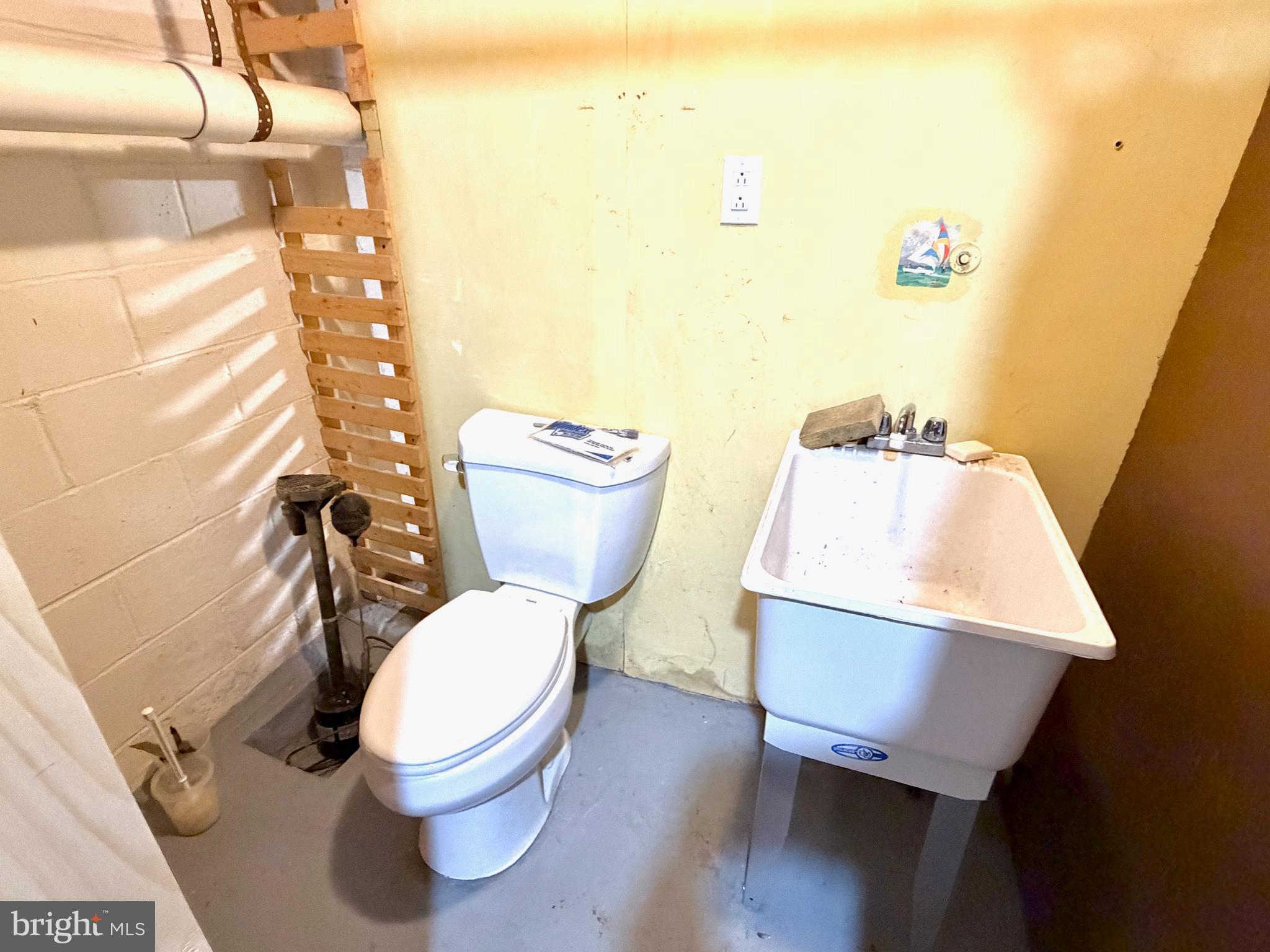 490 Meadow Lane Lebanon, PA 17042 - Photo 21 of 31 a white toilet sitting next to a bathroom sink