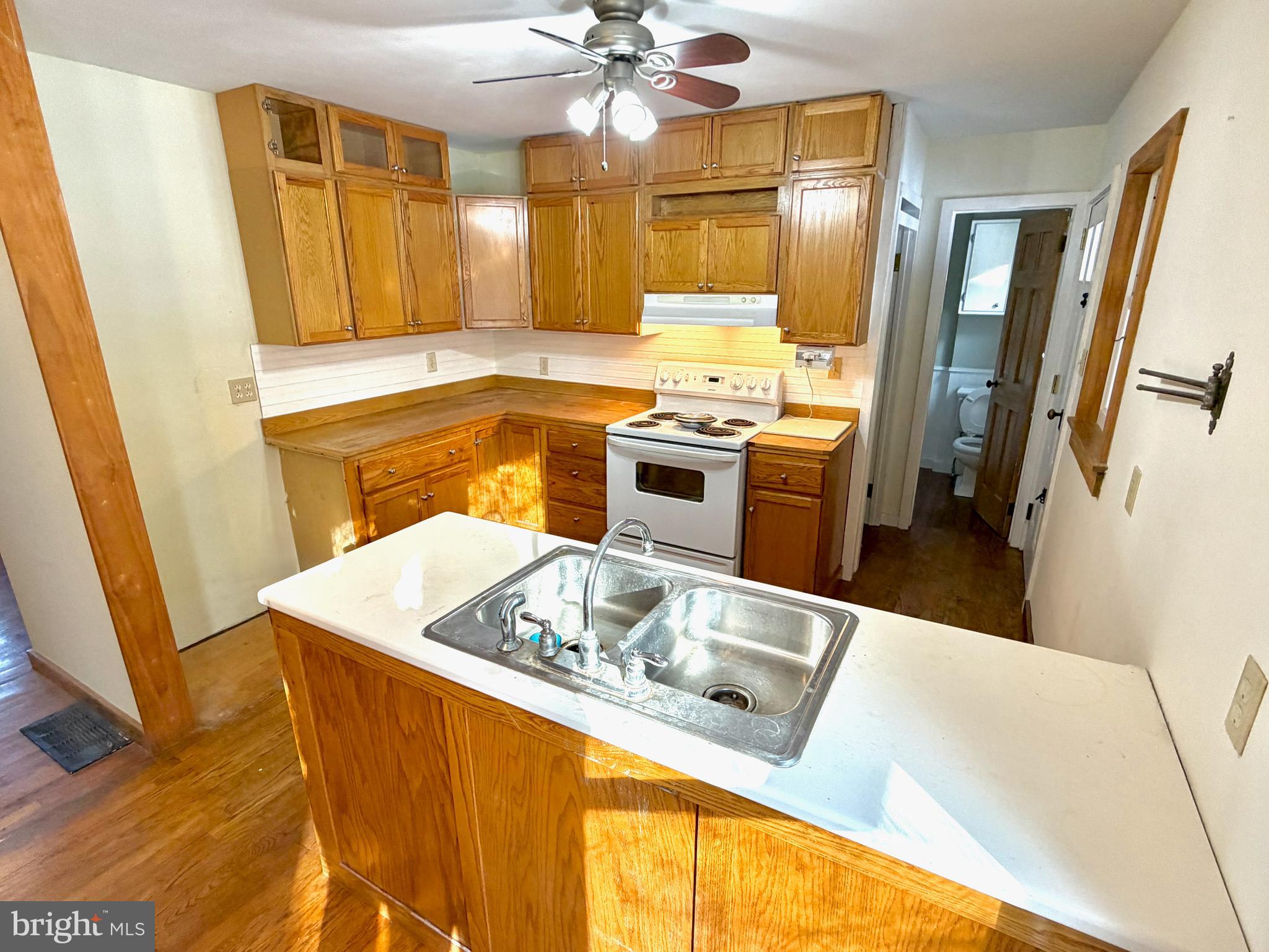 490 Meadow Lane Lebanon, PA 17042 - Photo 9 of 31 a kitchen with stainless steel appliances granite countertop a sink refrigerator and a stove