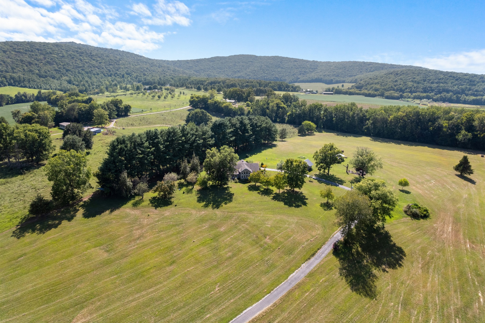 1556 Chestnut Grove Road Morrison, TN 37357 - Photo 47 of 58 a view of a lake with a mountain