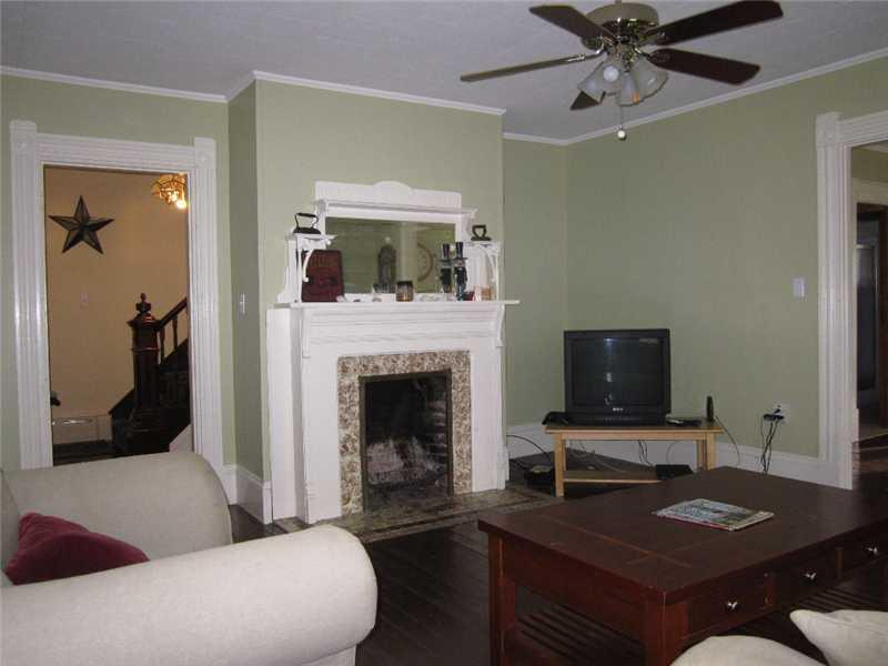 1614 South River Road Calais, ME 04619 - Photo 17 of 29 Living Room. Custom fireplace border...