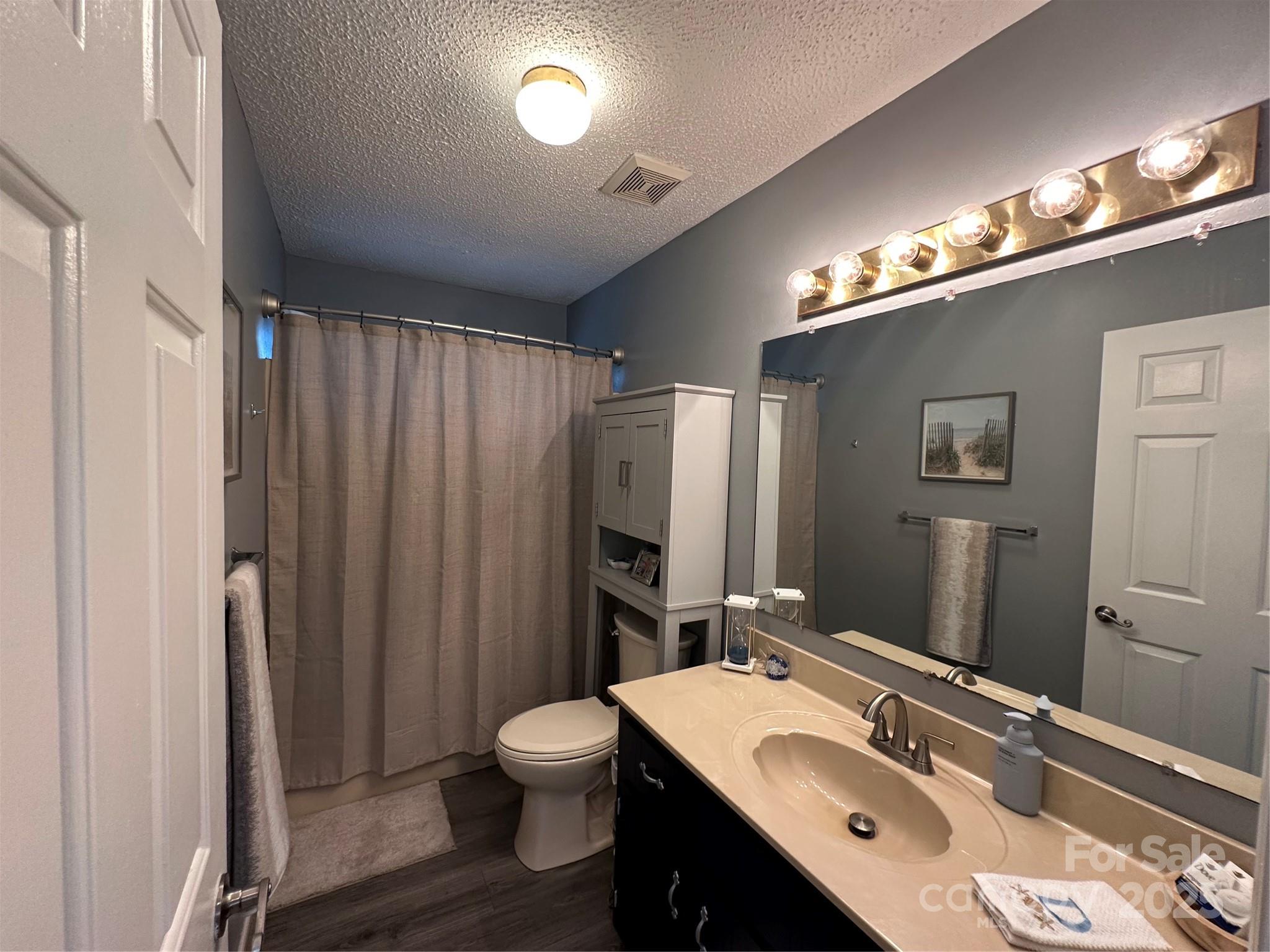 102 Stephens Drive Morganton, NC 28655 - Photo 28 of 48 a bathroom with a sink double vanity and a mirror