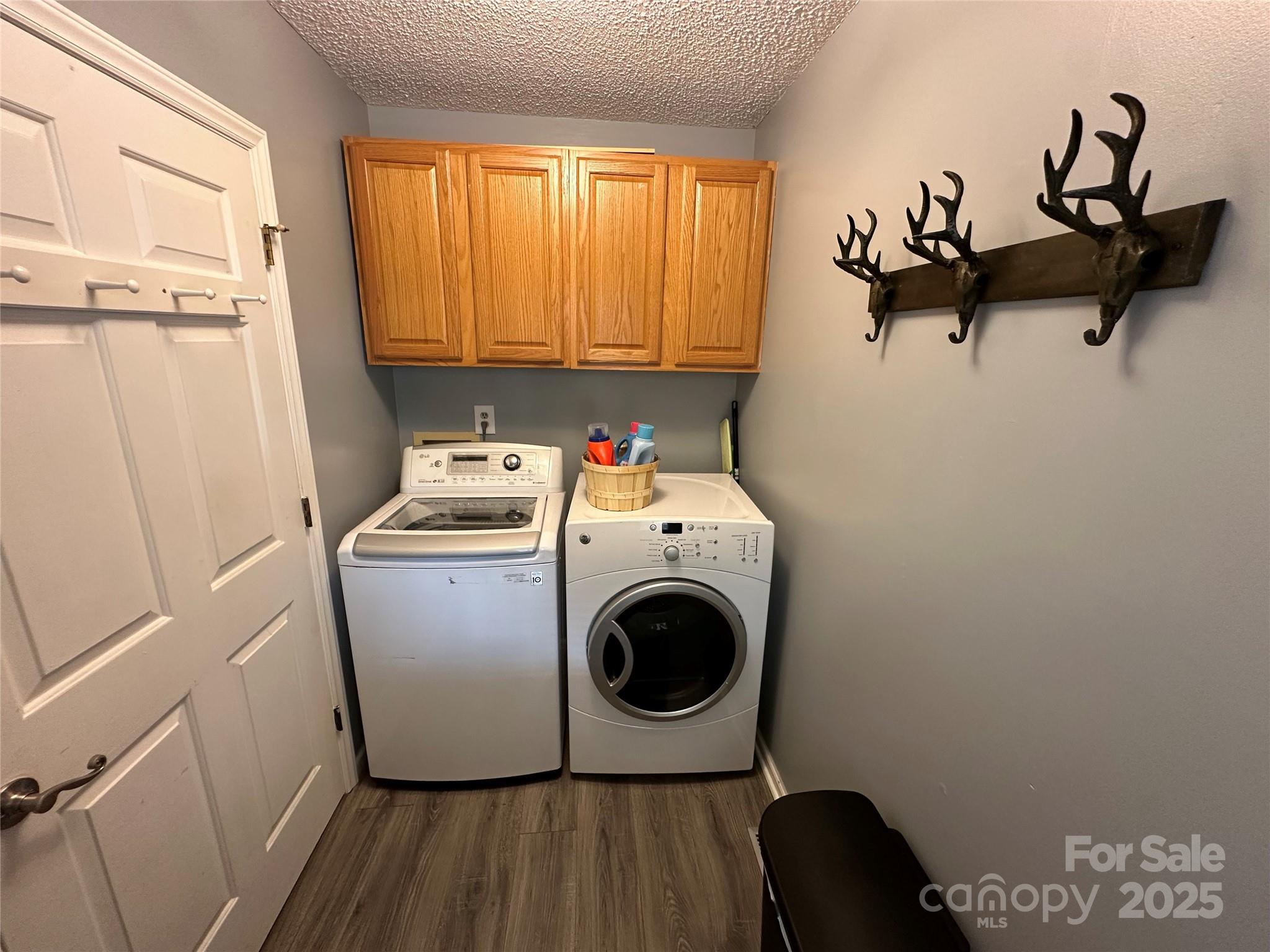 102 Stephens Drive Morganton, NC 28655 - Photo 29 of 48 a utility room with dryer washer and a window