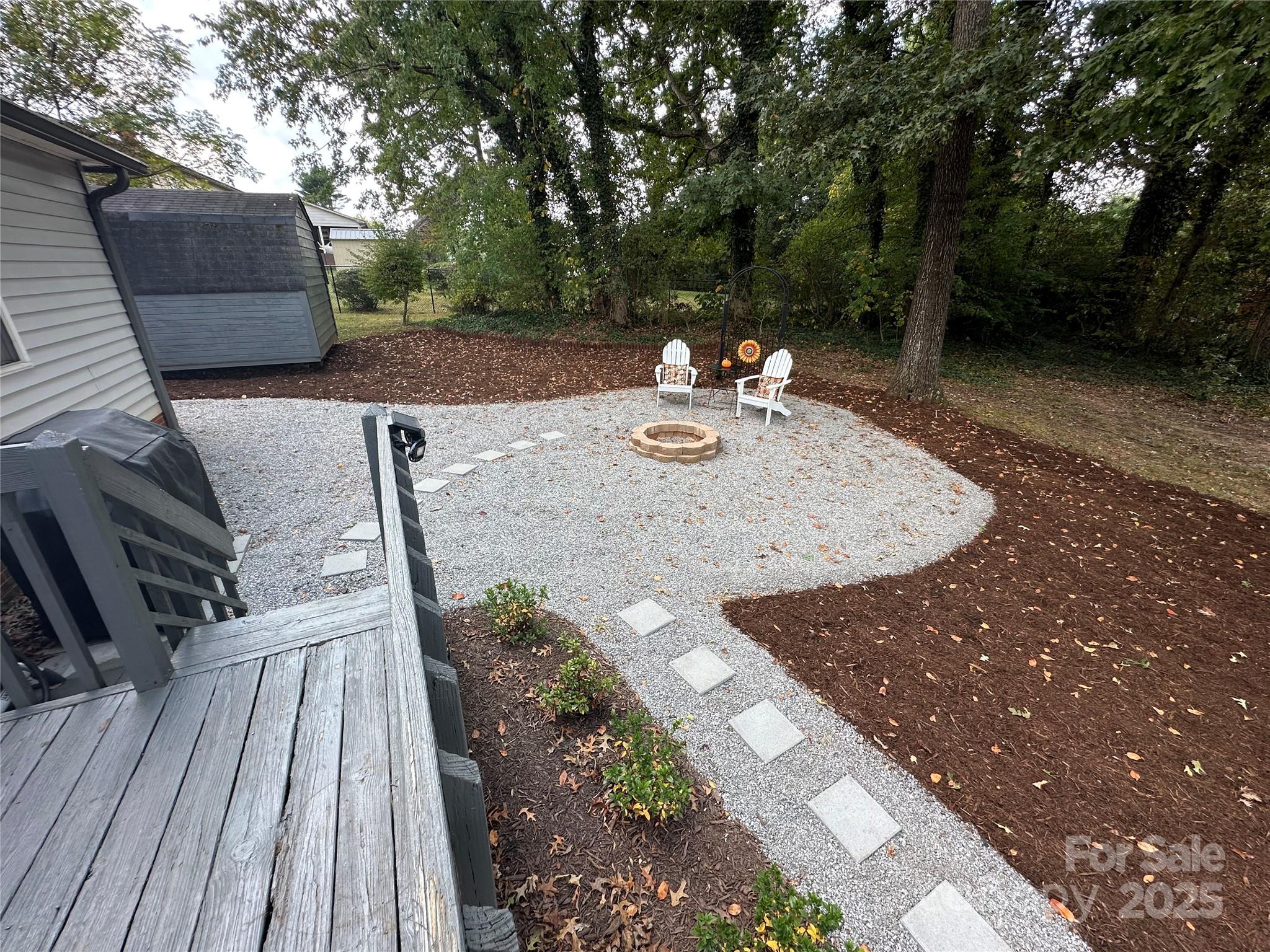 102 Stephens Drive Morganton, NC 28655 - Photo 4 of 48 a view of a backyard with sitting area