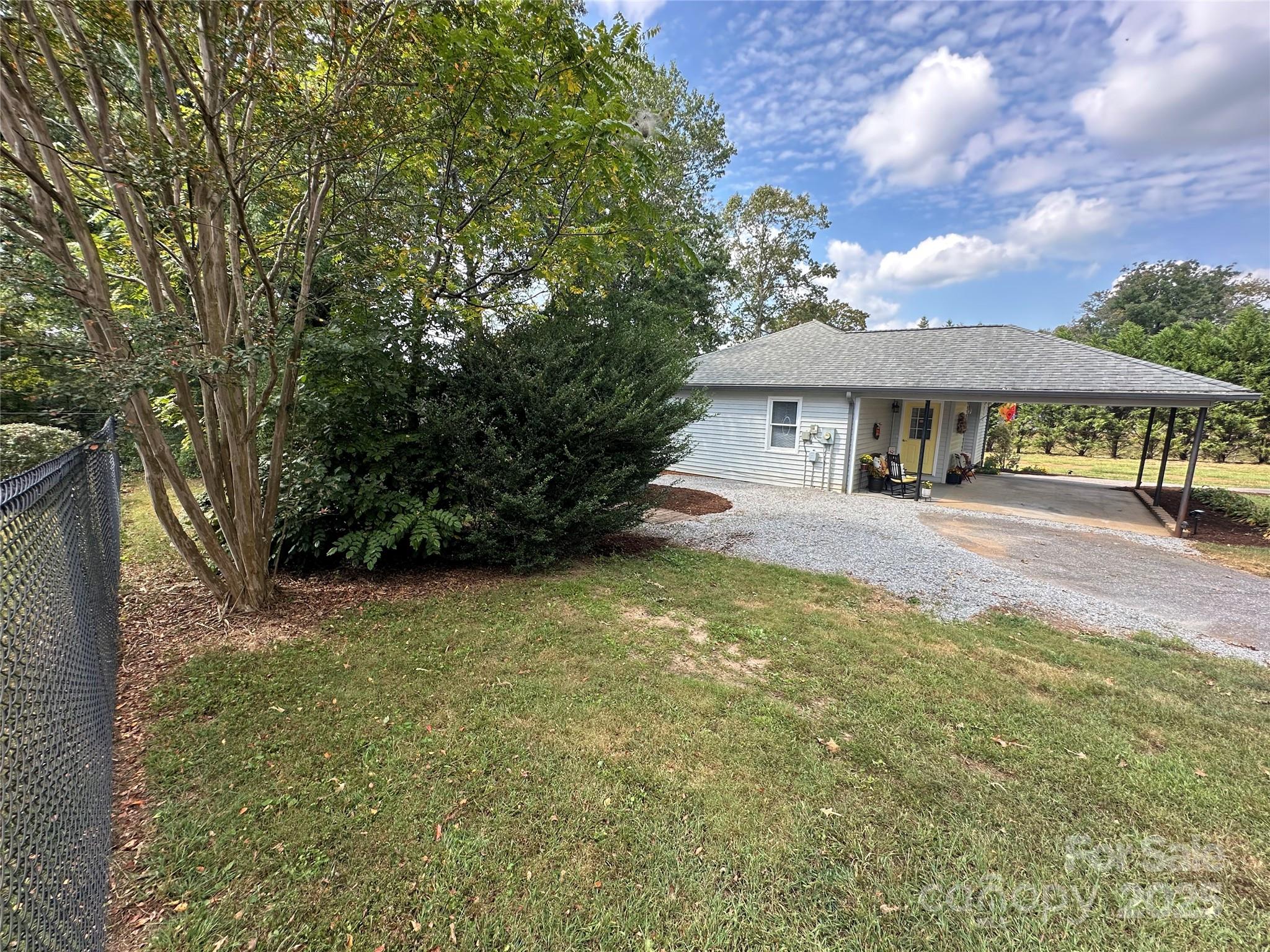 102 Stephens Drive Morganton, NC 28655 - Photo 42 of 48 a front view of a house with garden