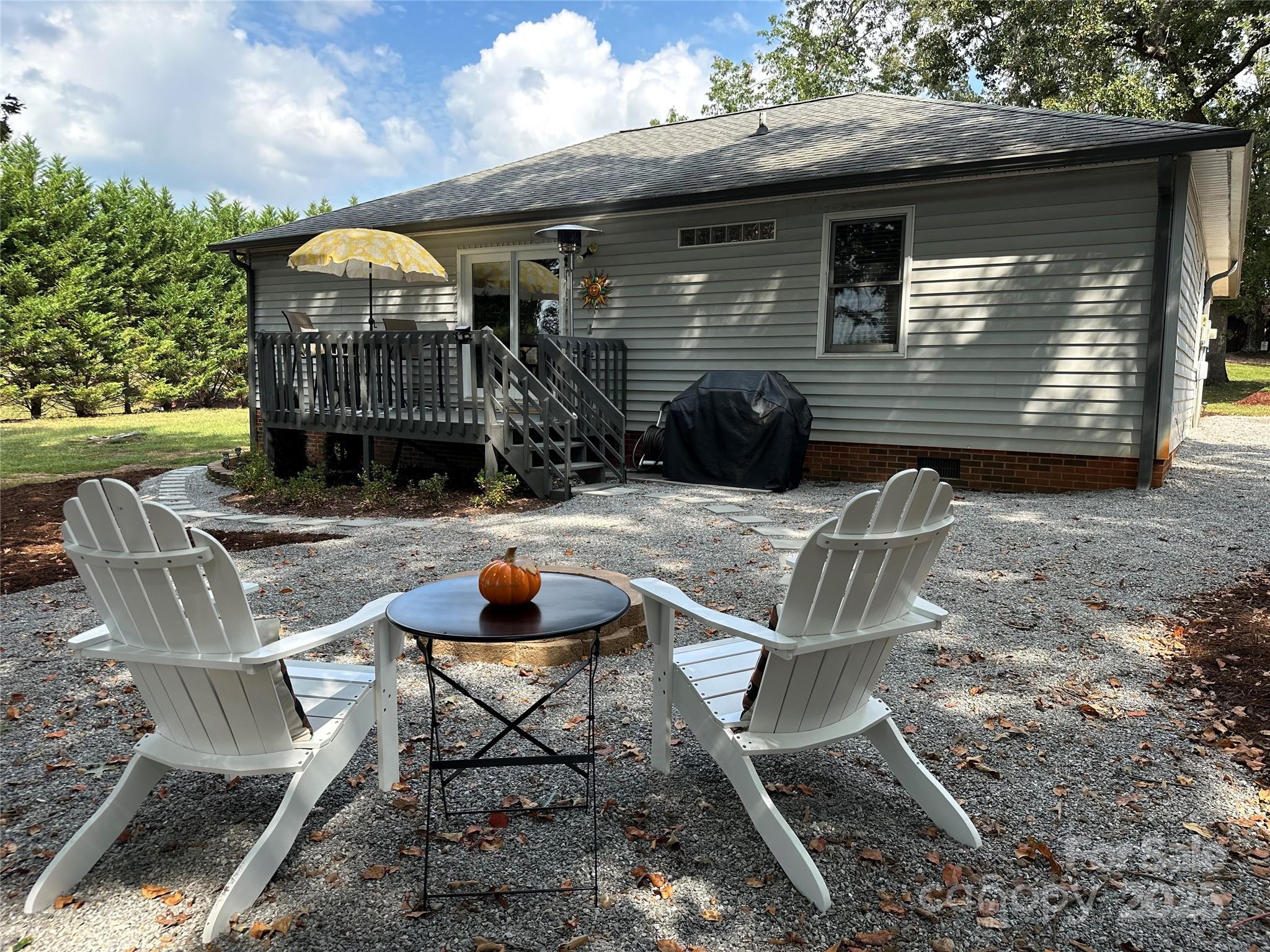 102 Stephens Drive Morganton, NC 28655 - Photo 46 of 48 a view of house with backyard and outdoor seating