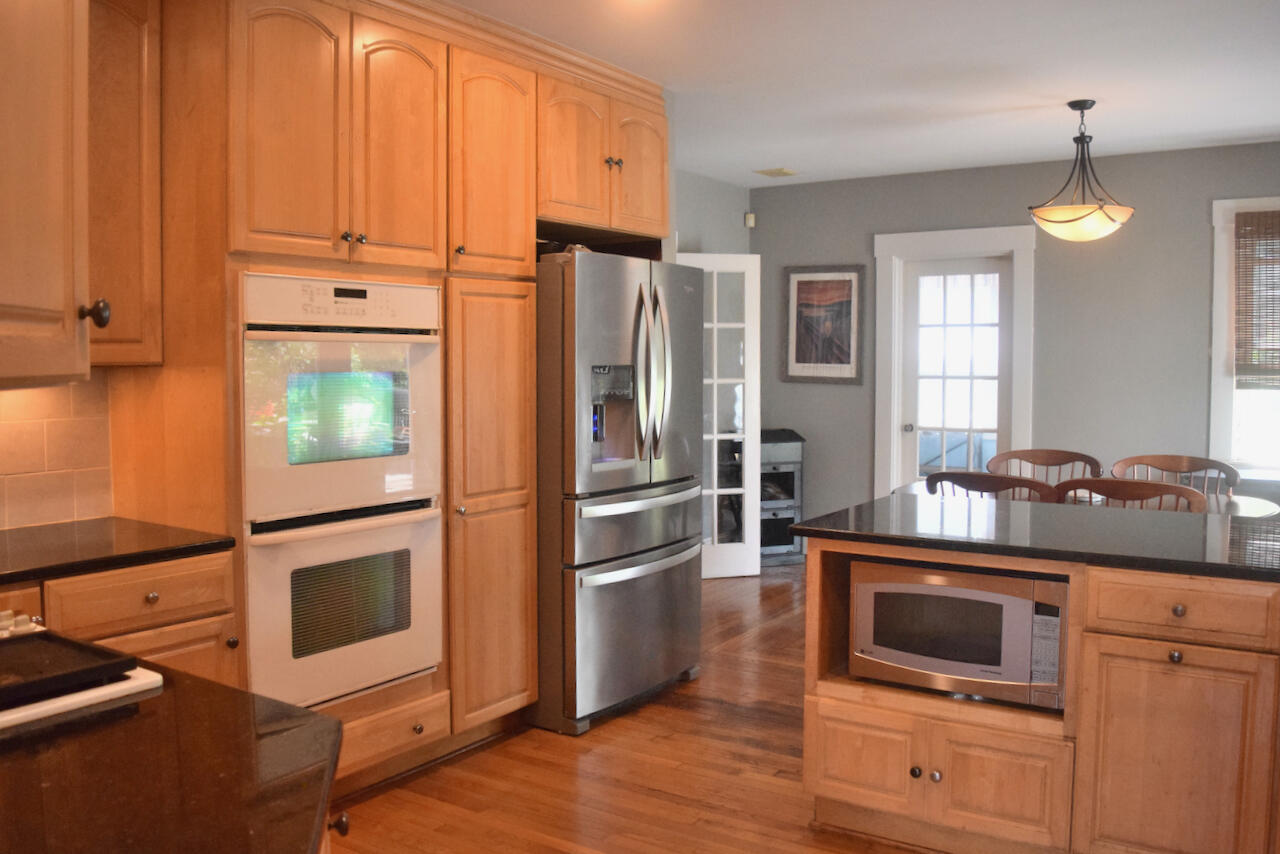 99 South Main Street Acushnet, MA 02743 - Photo 13 of 46 a kitchen with appliances cabinets and a sink